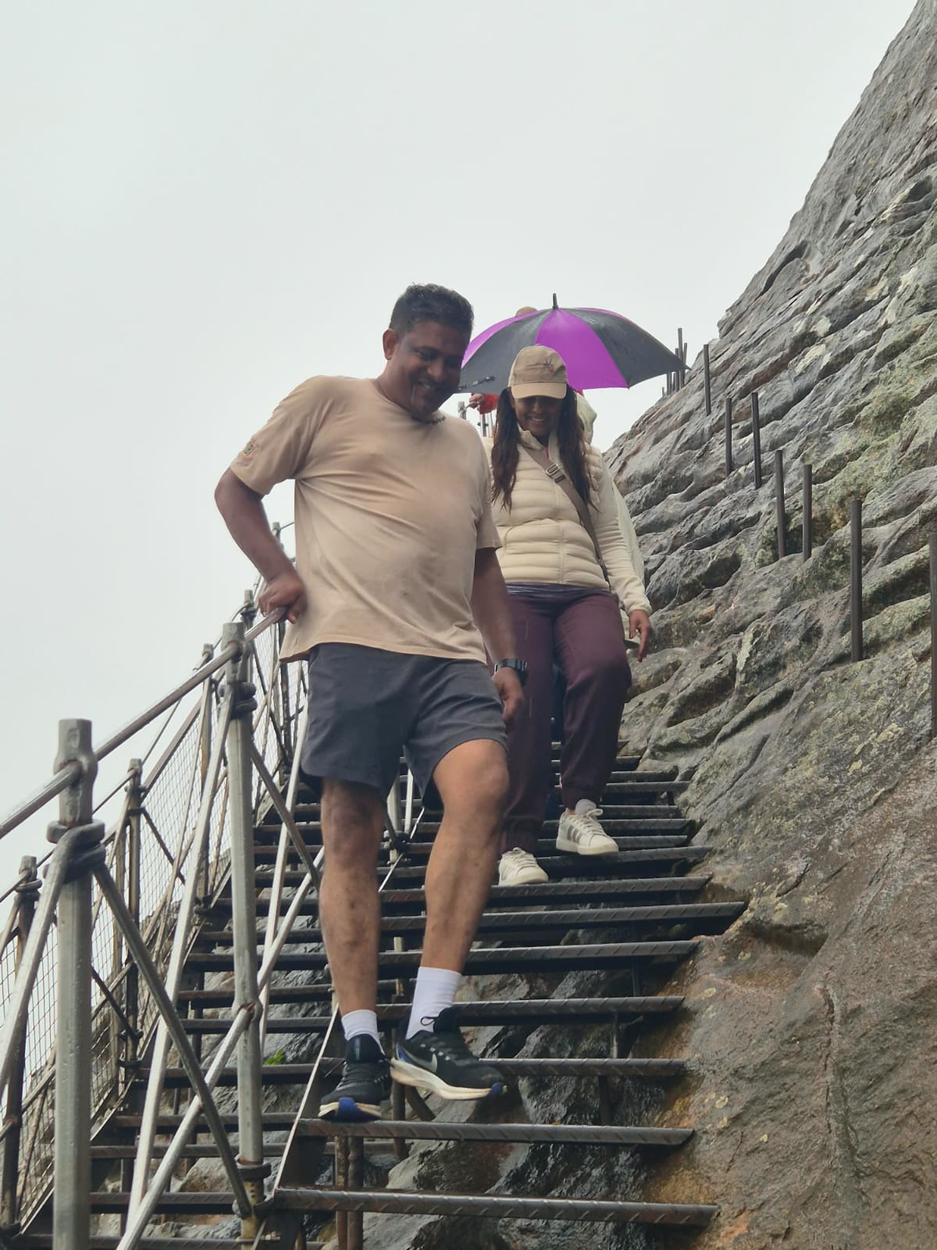 Guests climbing rock steps